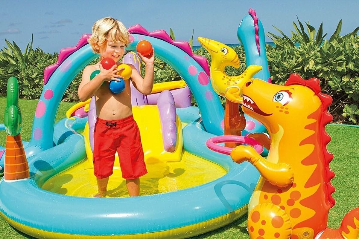 Colorful Intex Dino swimming slide and pool viewed from the side for kids to enjoy summer playtime