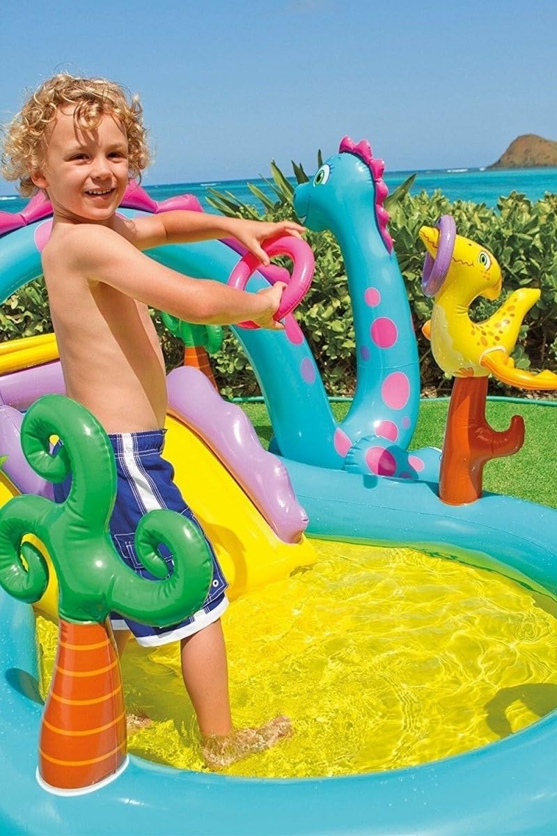 Intex Dino swimming slide and pool at Sam's Toy World Ahmedabad Gujarat with colorful dinosaurs and a child playing