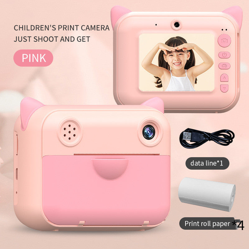 Pink kids camera with printer, front view, designed for fun photo printing and instant memories