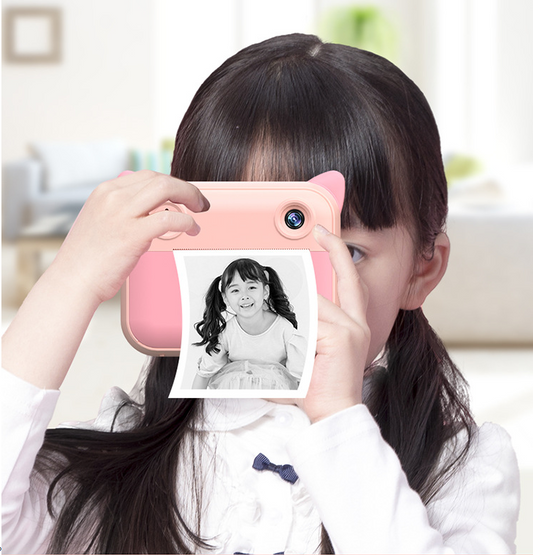 Pink kids camera with printer, front view, perfect for capturing memories for children