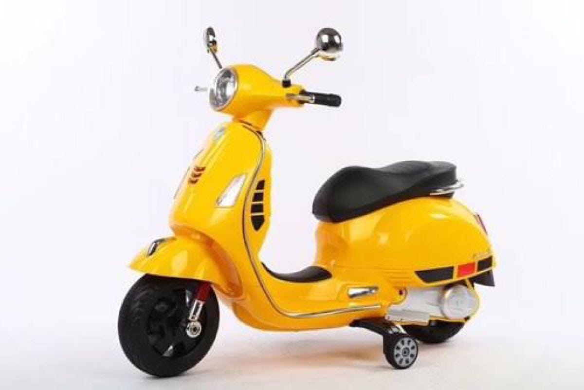Kids vespa scooter in bright yellow for ages 3-8, perfect battery scooter for kids in Ahmedabad Gujarat, from Sam's Toy World