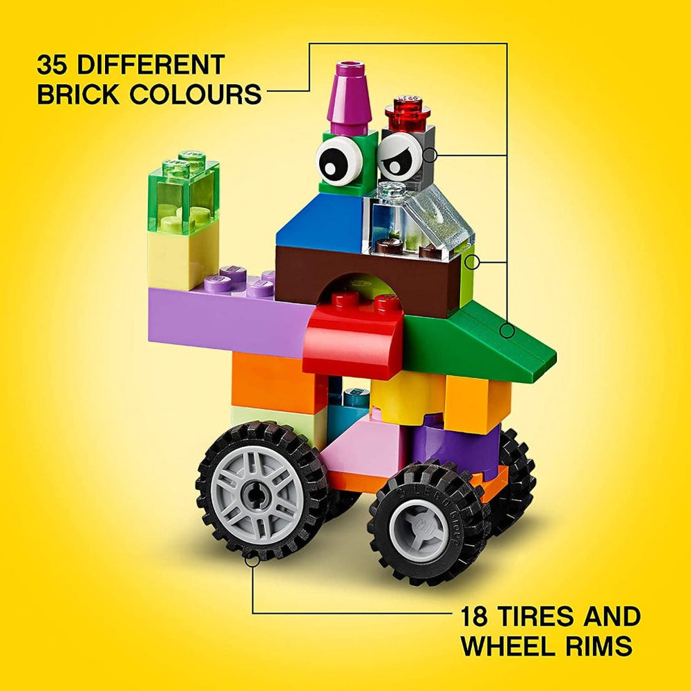 Colorful brick vehicle with wheels on yellow background LEGO Classic Creative Brick Box 10696 Ahmedabad Gujarat online India .