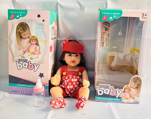 realistic baby doll with accessories silicone real Doll Ahmedabad . doll in red outfit with hat and bottle in box