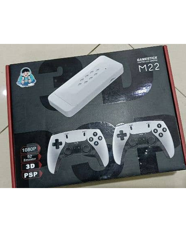 M22 Gamestick, white game console box showing two controllers, for gaming with pre-installed titles.