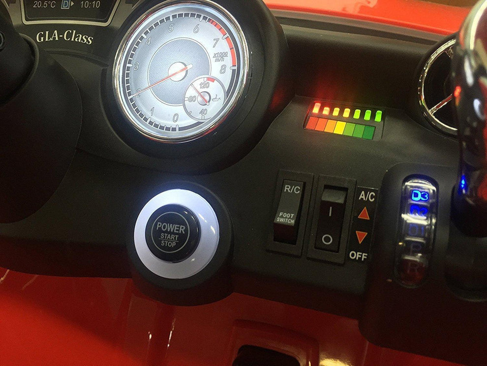 Dashboard close-up showing power start button and controls of Mercedes Benz battery operated car for kids in Ahmedabad Gujarat