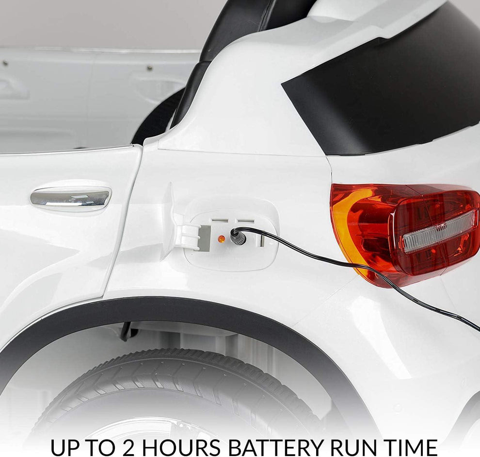 White Mercedes Benz battery operated car for kids in Ahmedabad Gujarat charging with visible rear light and wheel