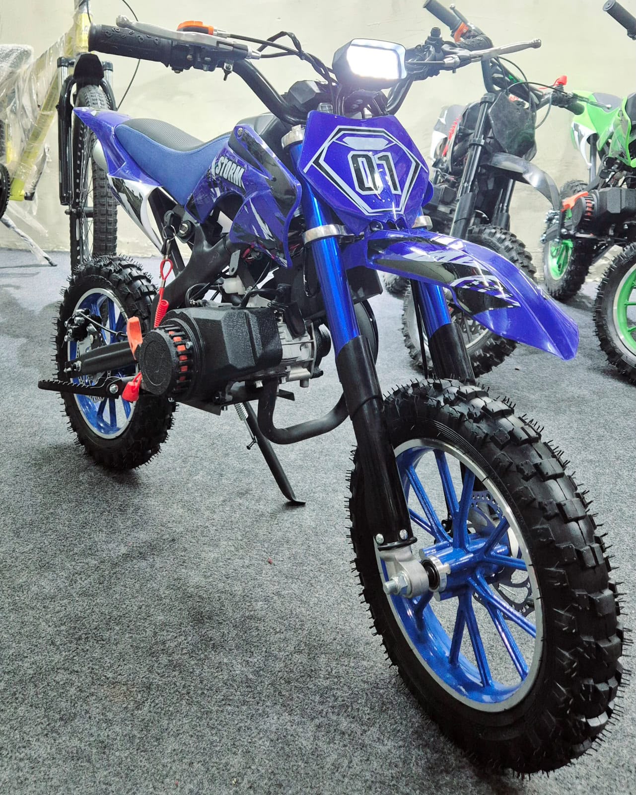 Blue Moto dirt bike dirt bike 50cc petrol bike for kids in Ahmedabad, front view, designed for fun outdoor rides