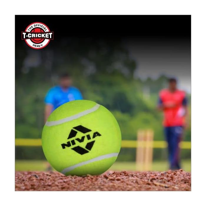 Nivia cricket tennis balls for kids In Ahmedabad online India . bright lime ball with Nivia logo on pitch near stumps