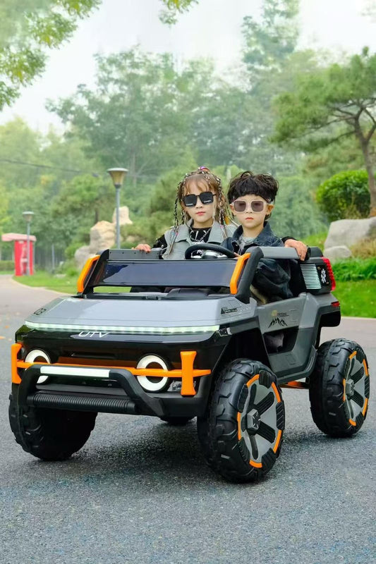 Rechargeable Kids Ride On Jeep Tesla Model Make In India with two children wearing sunglasses