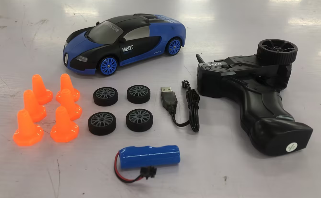 Blue and black remote control car with remote, racing set, includes cones and accessories for outdoor fun