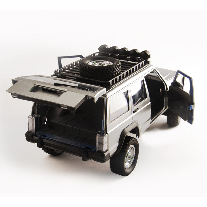 Sam's Toy World remote control car with remote in silver with open doors for ages 6 and up