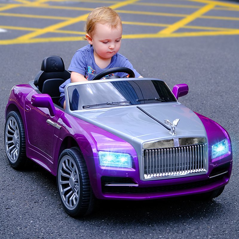 Kids enjoying the Rolls Royce Battery Operated Ride on Car with LED headlights and realistic design
