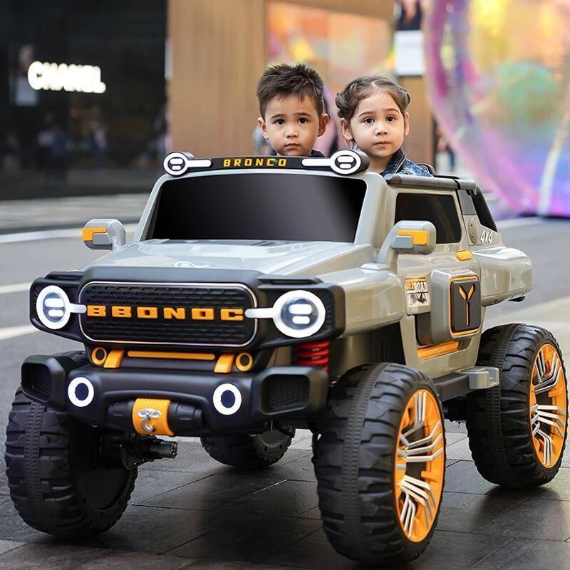 Kids riding a remote control 3 seater jeep jumbo big size by Sam's Ahmedabad toy car in gray and orange