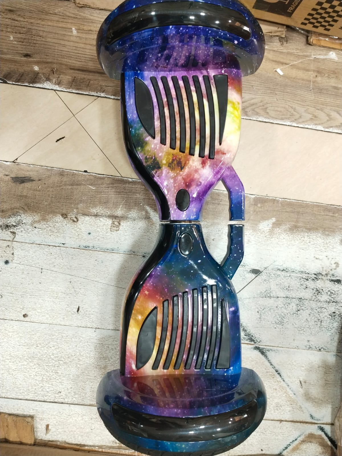 Colorful galaxy design 10 inch hoverboard for children Sam’s Toy Ahmedabad Online India on wooden floor