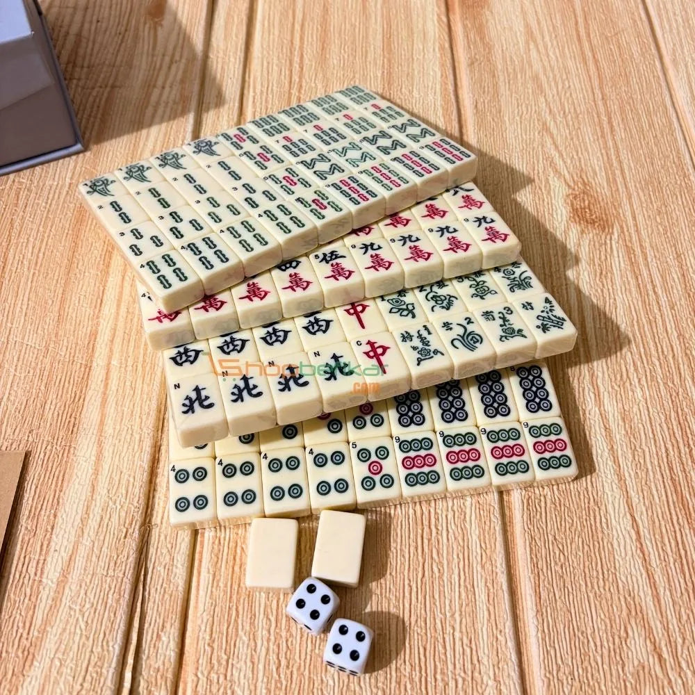 Mah jongg games in Ahmedabad by Sam's Toy with traditional tiles and dice, laid out for play