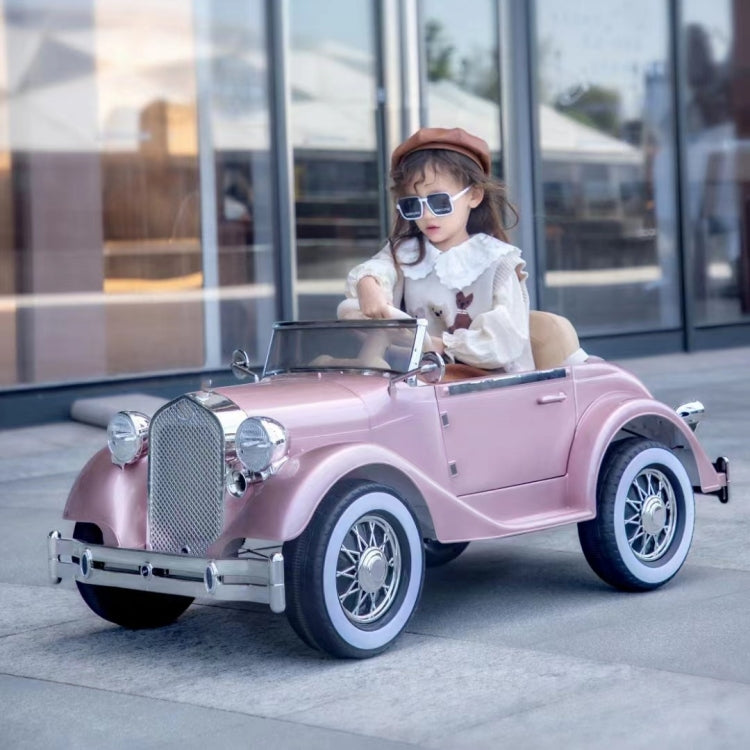 Pink vintage ride on car with girl in sunglasses Rolls Royce vintage ride on car for kids Ahmedabad Gujarat Online India