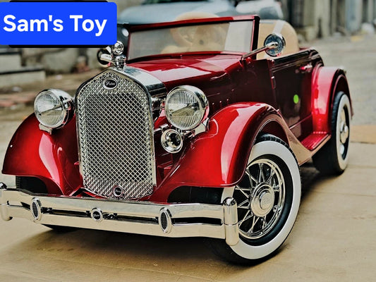 Red glossy electric toy car with chrome grille Rolls Royce vintage ride on car for kids Ahmedabad Gujarat Online India