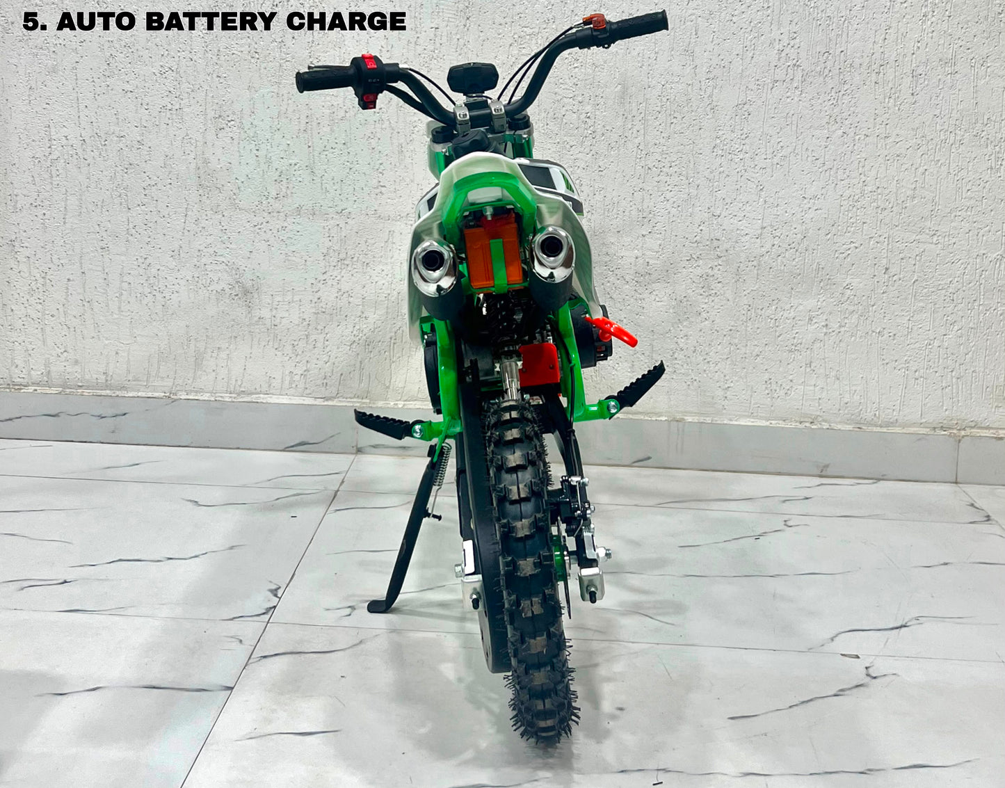 Green 49cc dirt bike in Ahmedabad by Sam's Toy World, rear view, perfect for young riders.