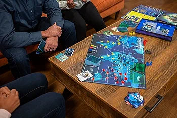 Cooperative board game from Sam's Toy World Ahmedabad, colorful map and cards, engaging family fun.