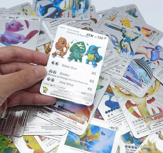Hand holding Pokemon trading card featuring Squirtle, Charmander, and Bulbasaur, showcasing abilities for Pokemon fans
