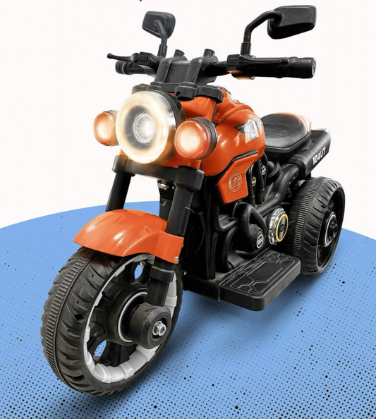 Battery operated sports bike for kids in orange with headlights and rubber tires, ₹2499 only at Sam’s Toy World Ahmedabad