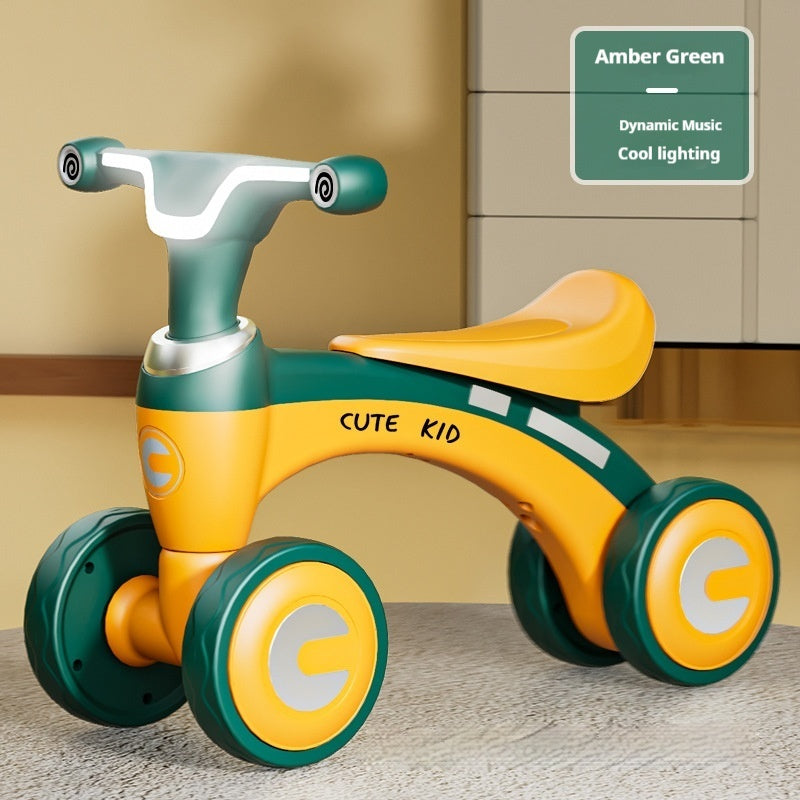 Amber Green Bike Balance Bike Sam's Toy World for toddlers with dynamic music and cool lighting