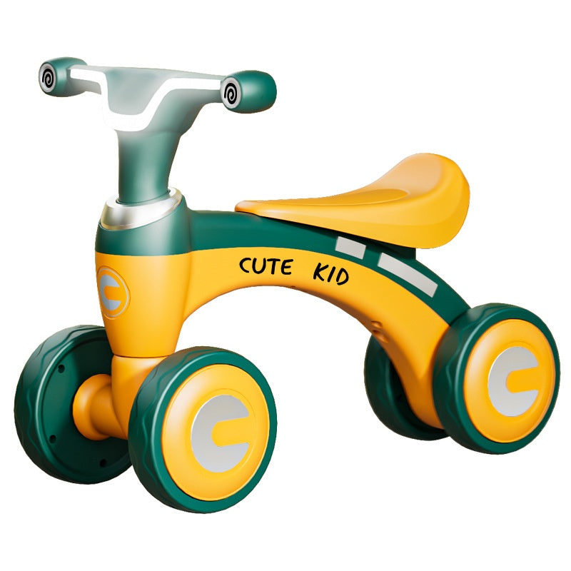 Cute Kid Balance Bike in Green and Yellow for toddlers at Sam's Toy World Ahmedabad