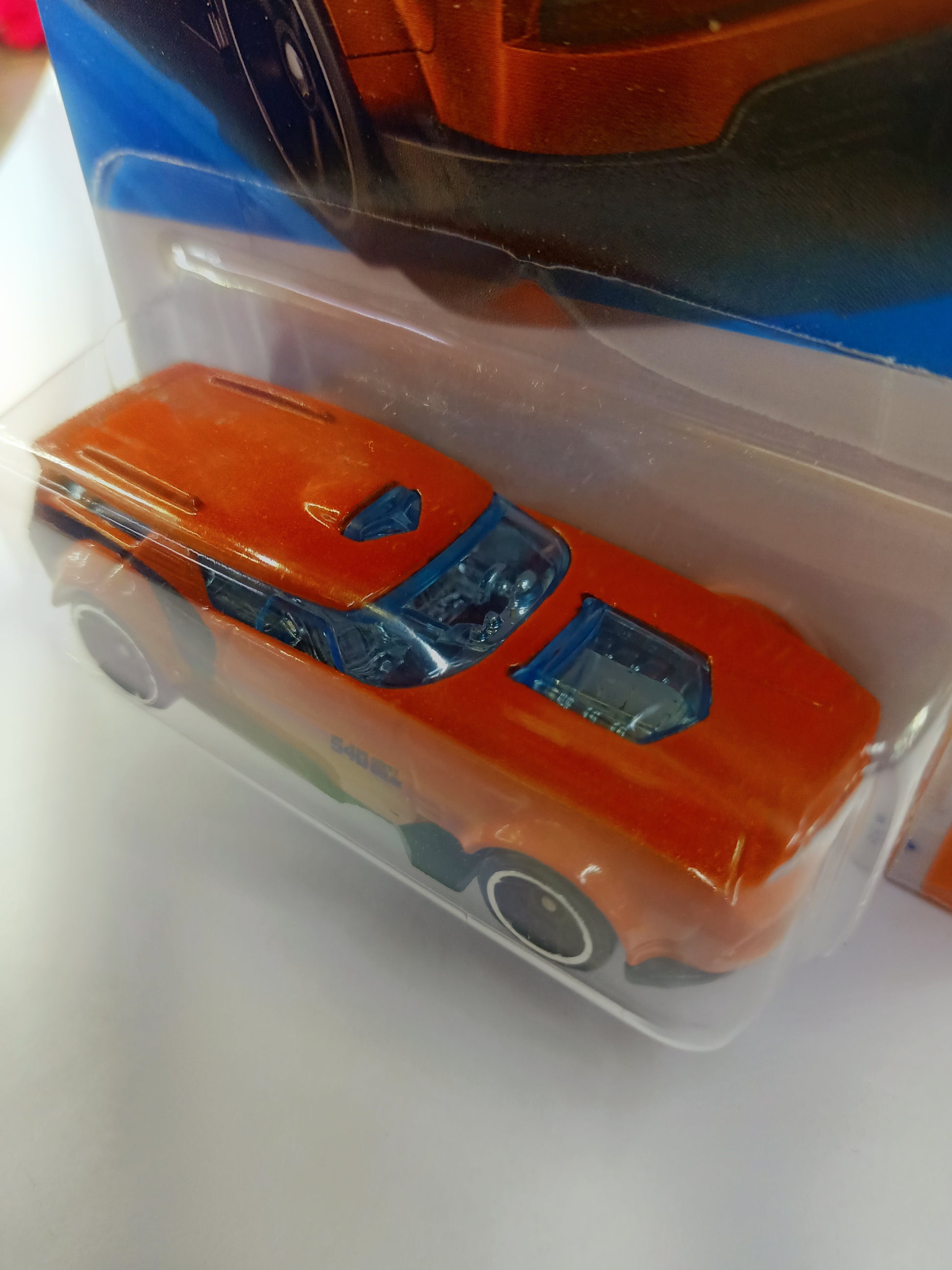 Hot Wheels orange collectible toy car from Sam's Toy World Hot Wheels collection in Ahmedabad packaging