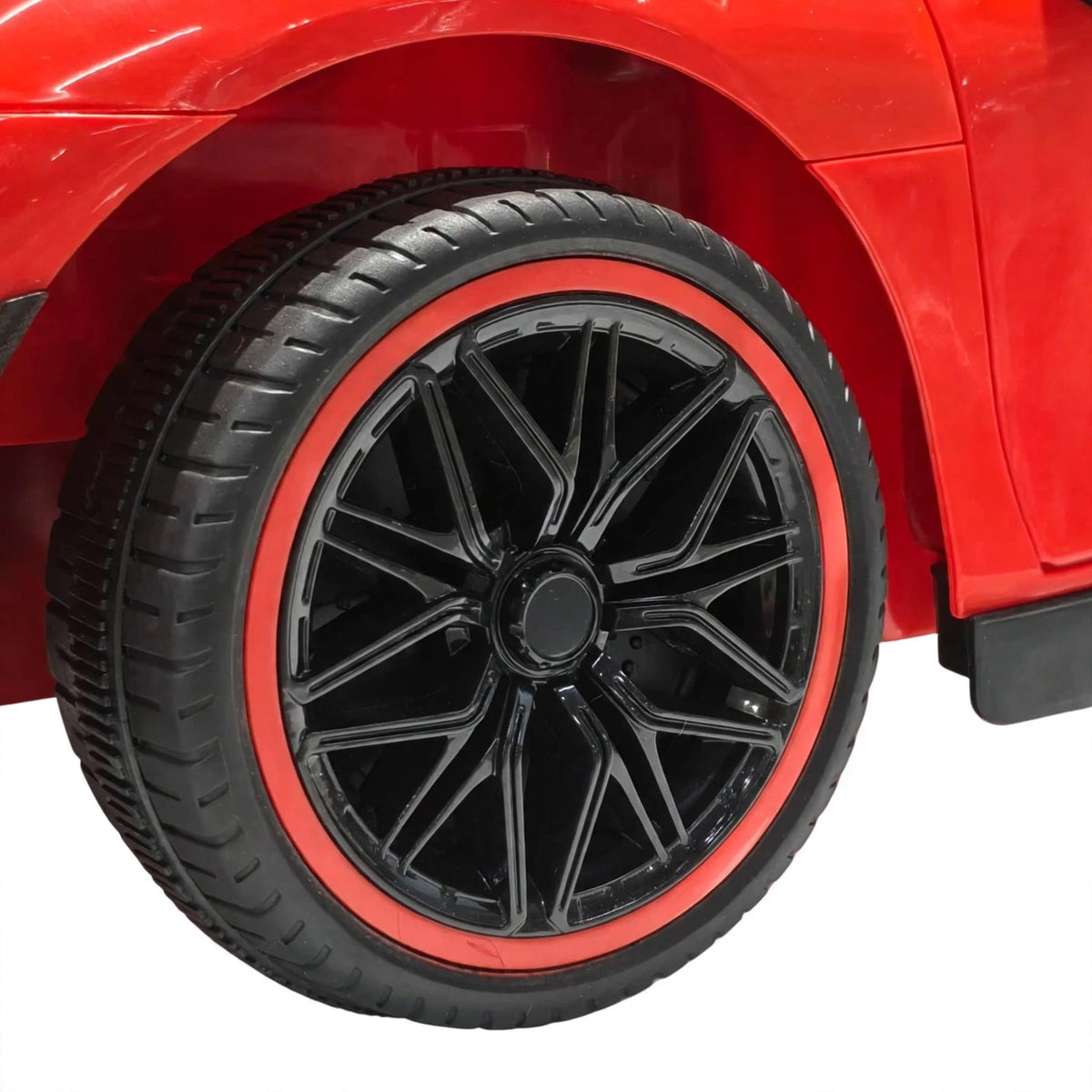 Kids Ferrari Rechargeable Electric Ride on kids car by Sam's Toy World Ahmedabad with stylish black wheels for ages 3-7