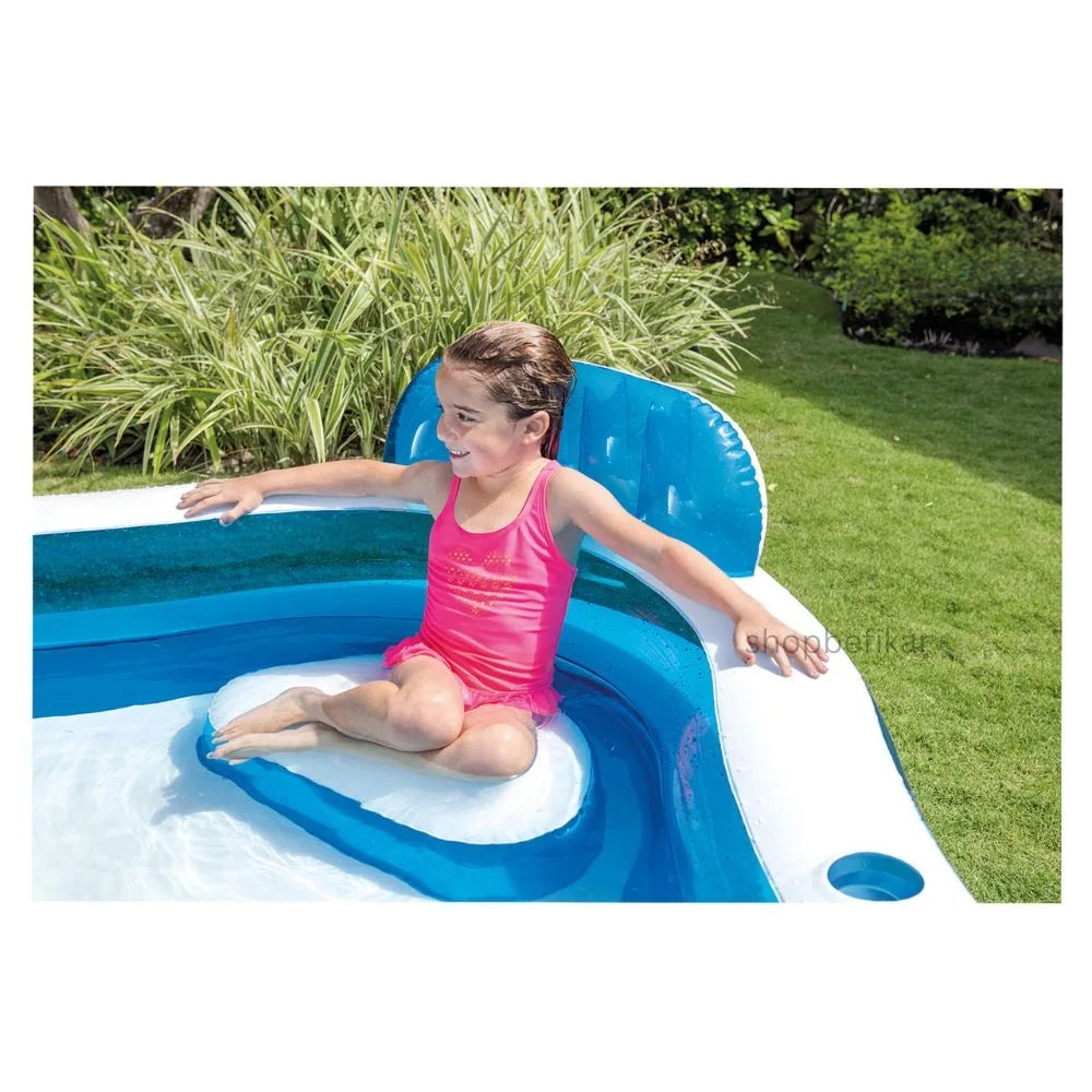 Intex inflatable swimming pool for adults and kids with built in backrest and cup holder showing child seated
