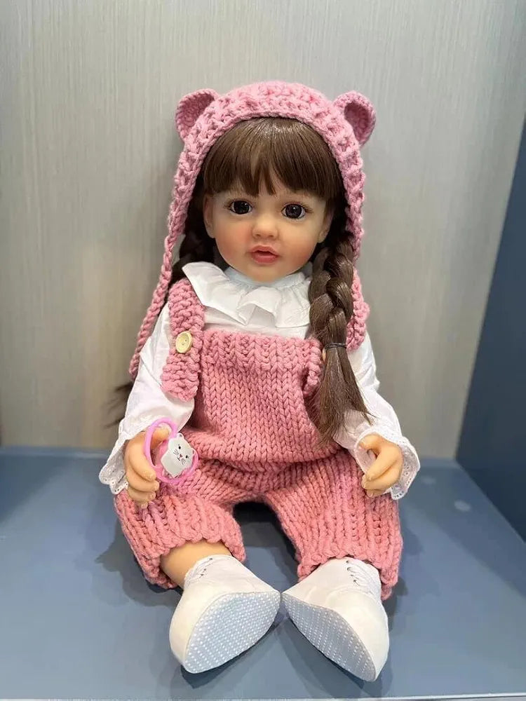 Silicon Doll in pink knitted outfit, perfect for kids aged 3 and up from Sam's Toy World. Real Baby Doll, Ai Doll Toy in Ahmedabad.