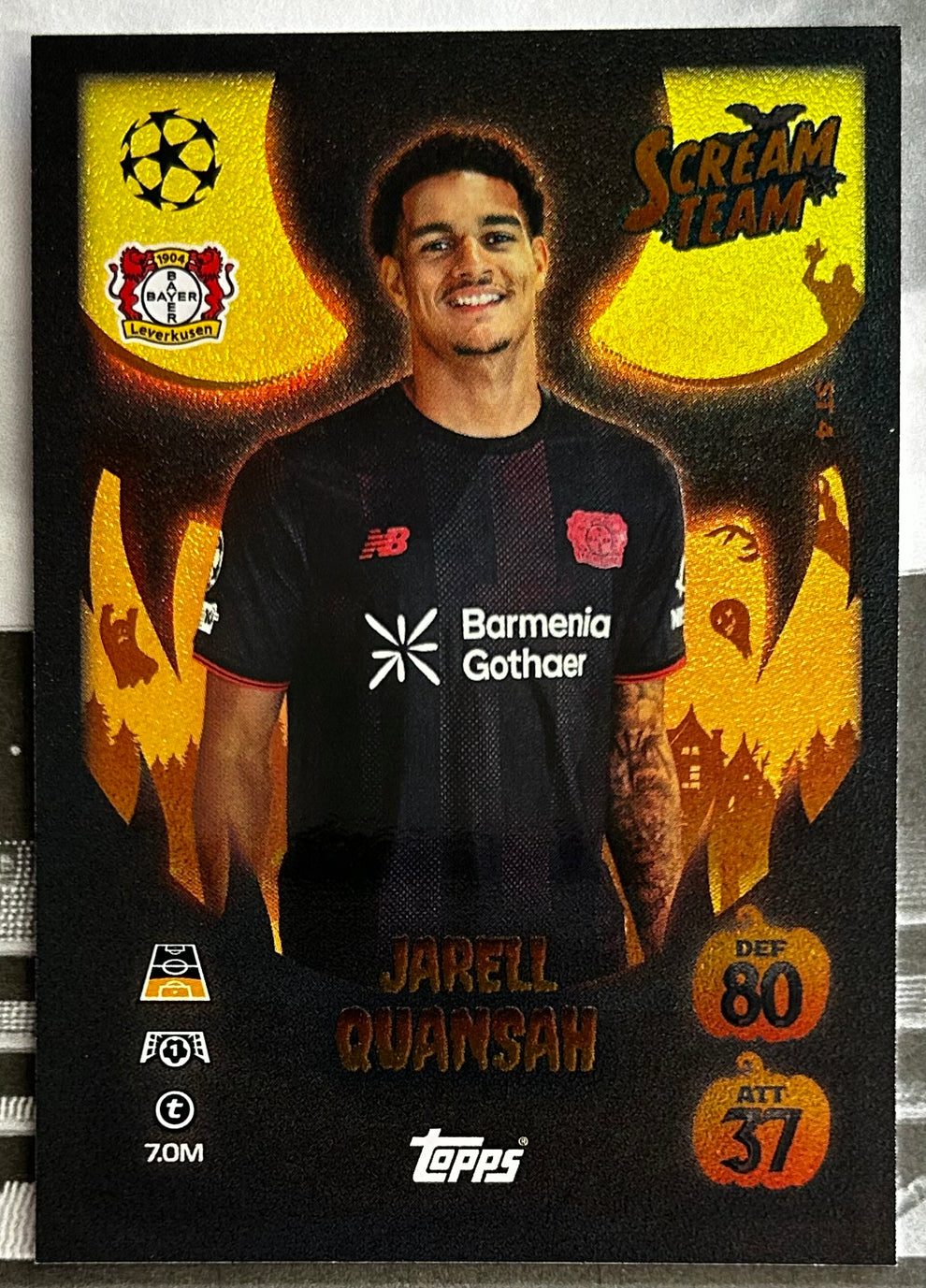 Topps soccer sports trading cards display featuring Jarell Quansah in black kit, showcasing skills and stats