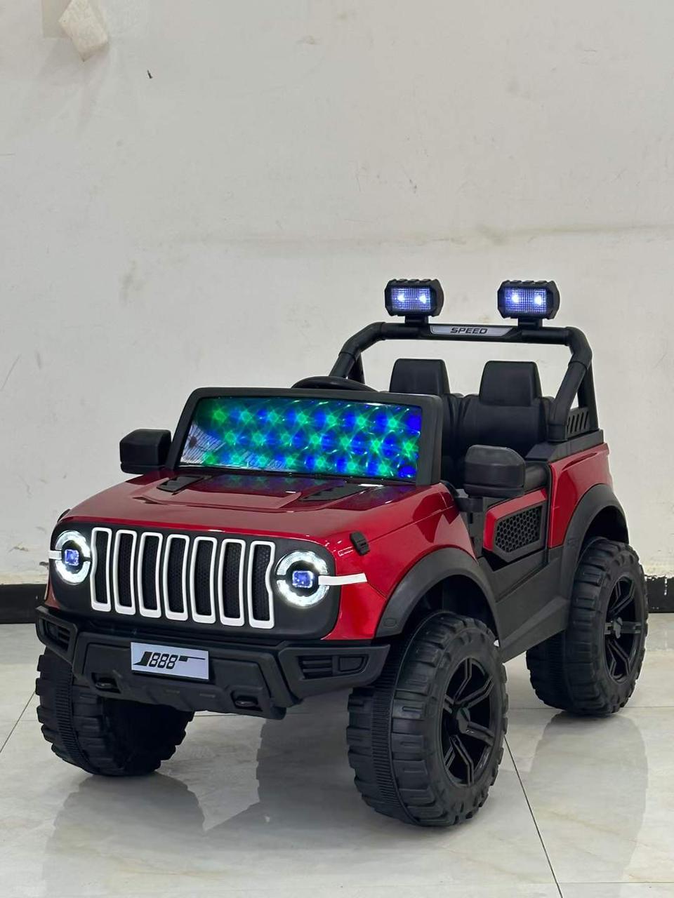Red toy Jeep with big wheels and LED lights four-wheel kids electric car best offer discounted price Ahmedabad .