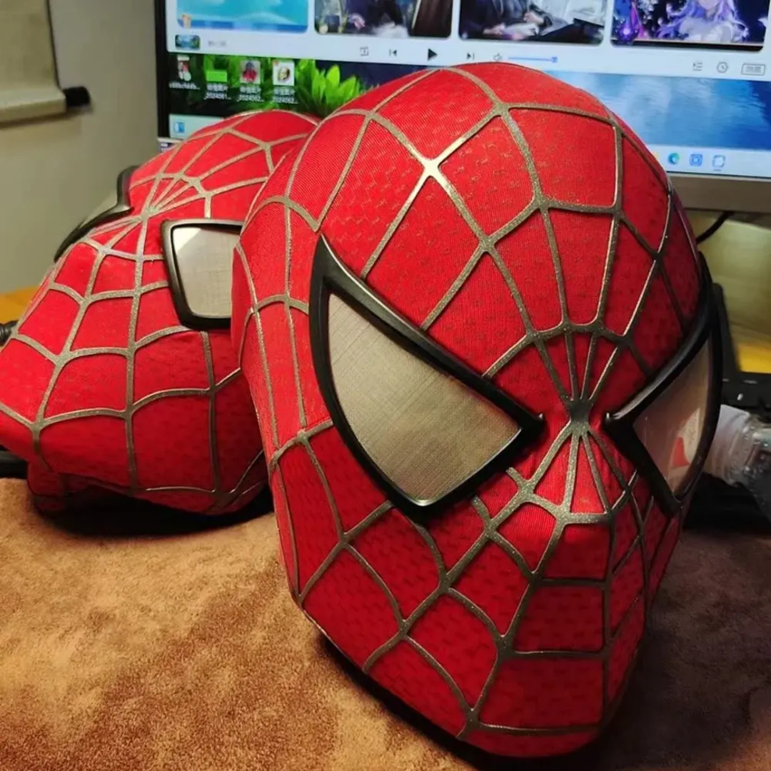 Red Spiderman mask with light-up eyes, front view, perfect for superhero dress-up play