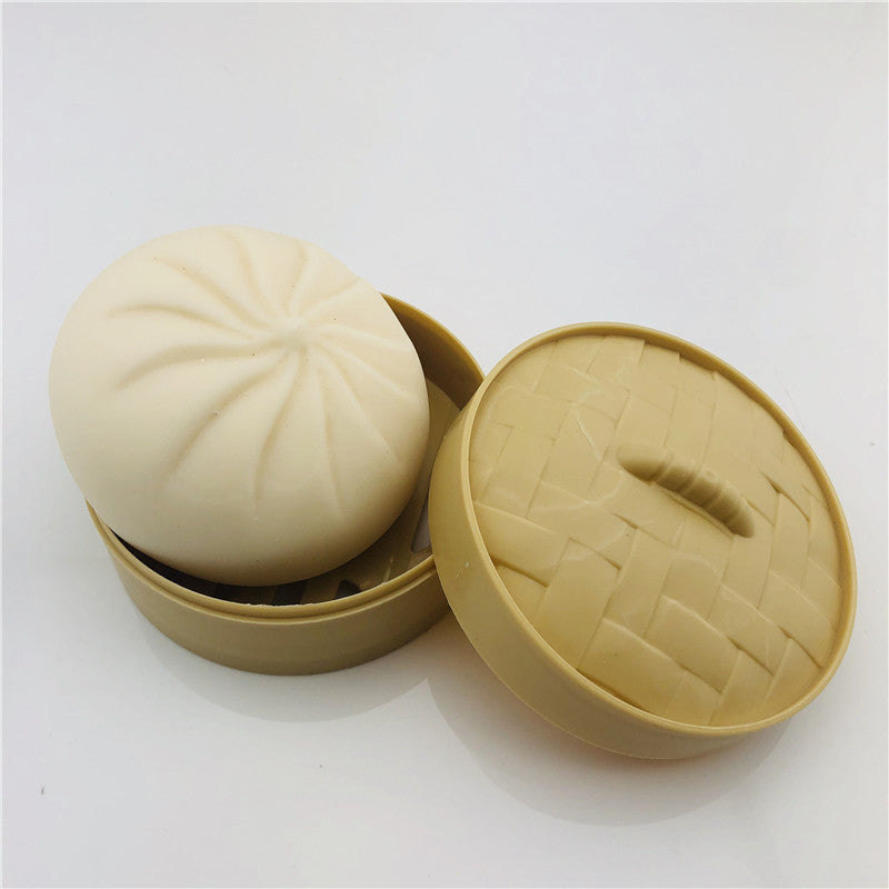White bao bun stress ball in woven container, top view for stress relief management techniques