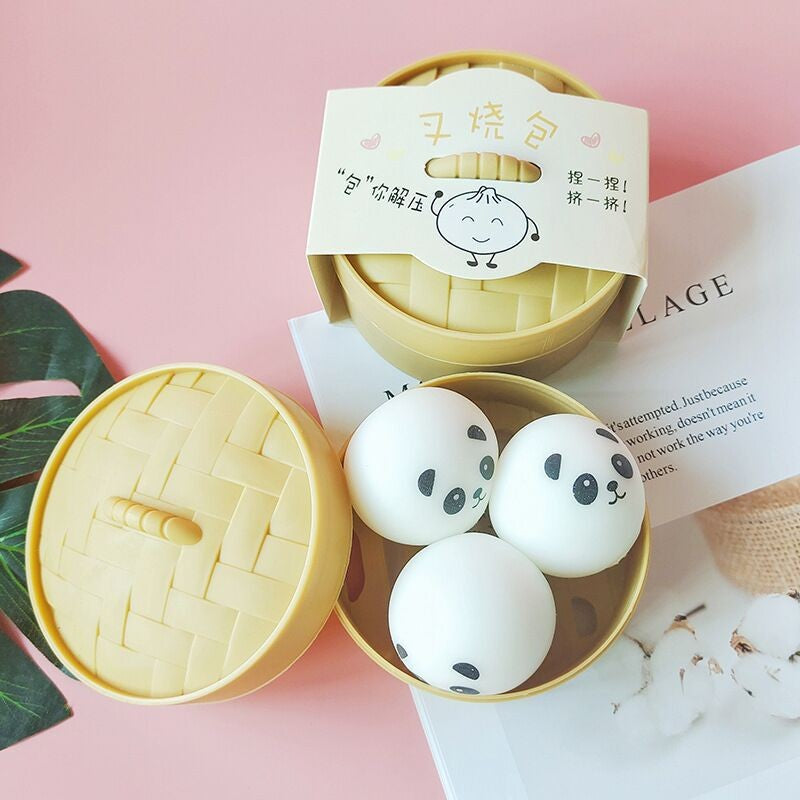 Yellow panda stress relief balls in a bamboo-style container, ideal for stress relief management techniques