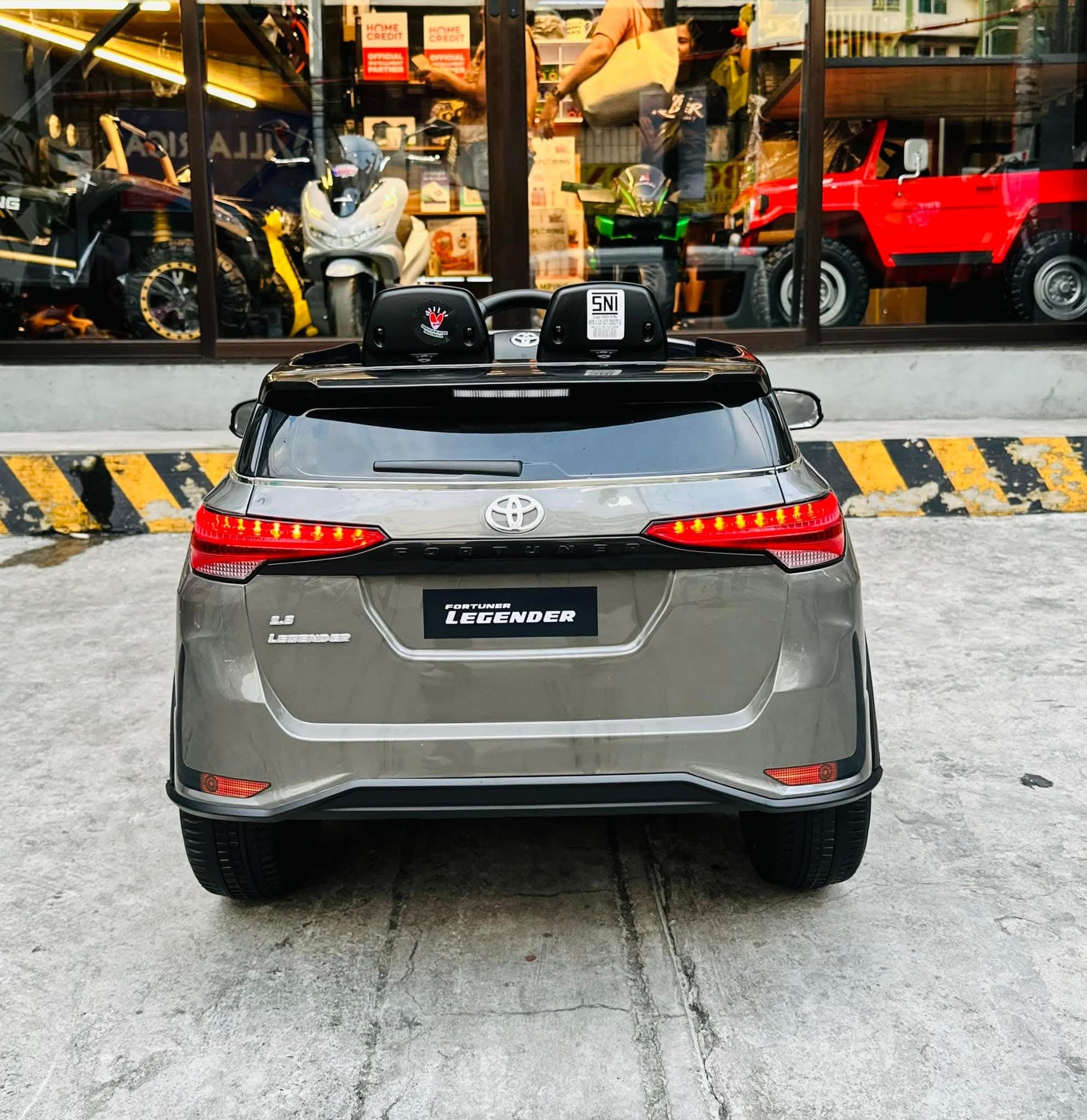Gray Toyota Fortune licensed ride-on car for kids Ahmedabad, back view, perfect for outdoor fun