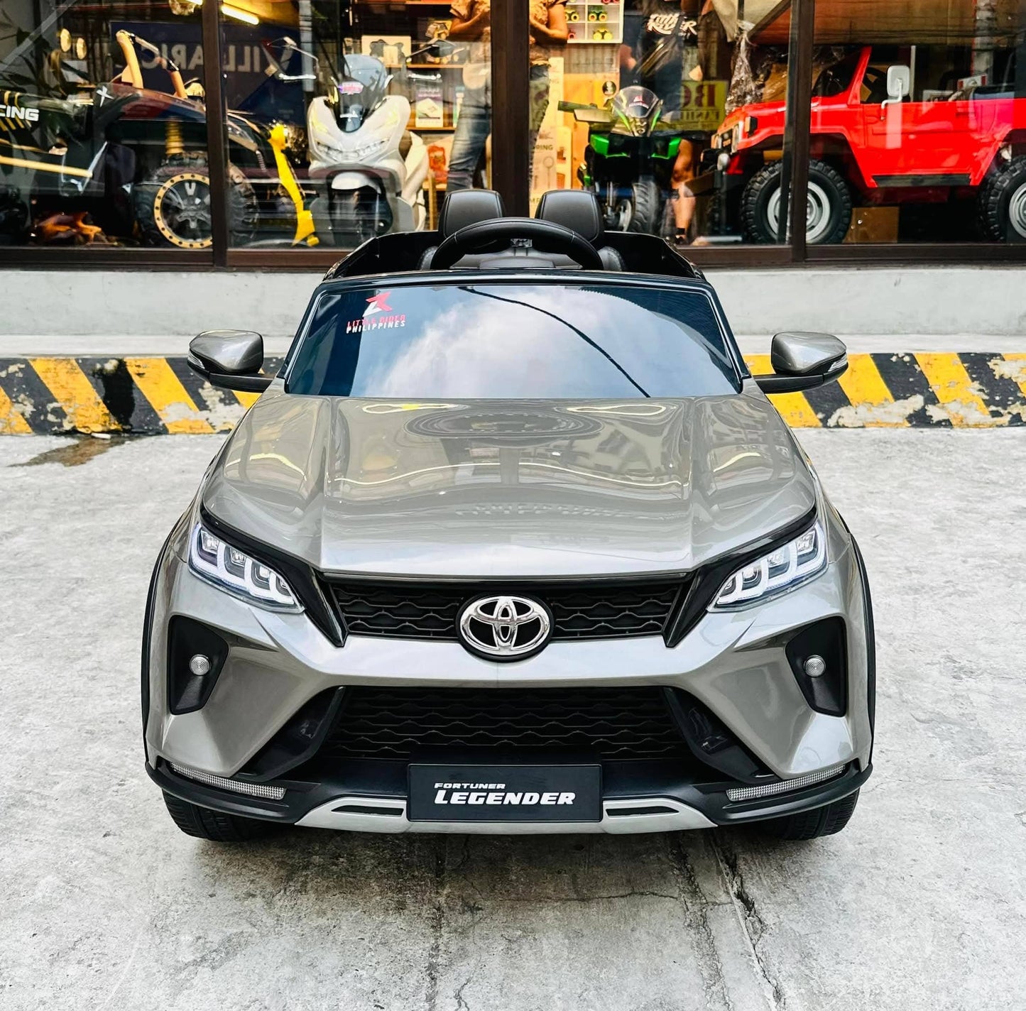 Gray Toyota Fortune licensed ride-on car for kids Ahmedabad, front view, perfect for outdoor fun