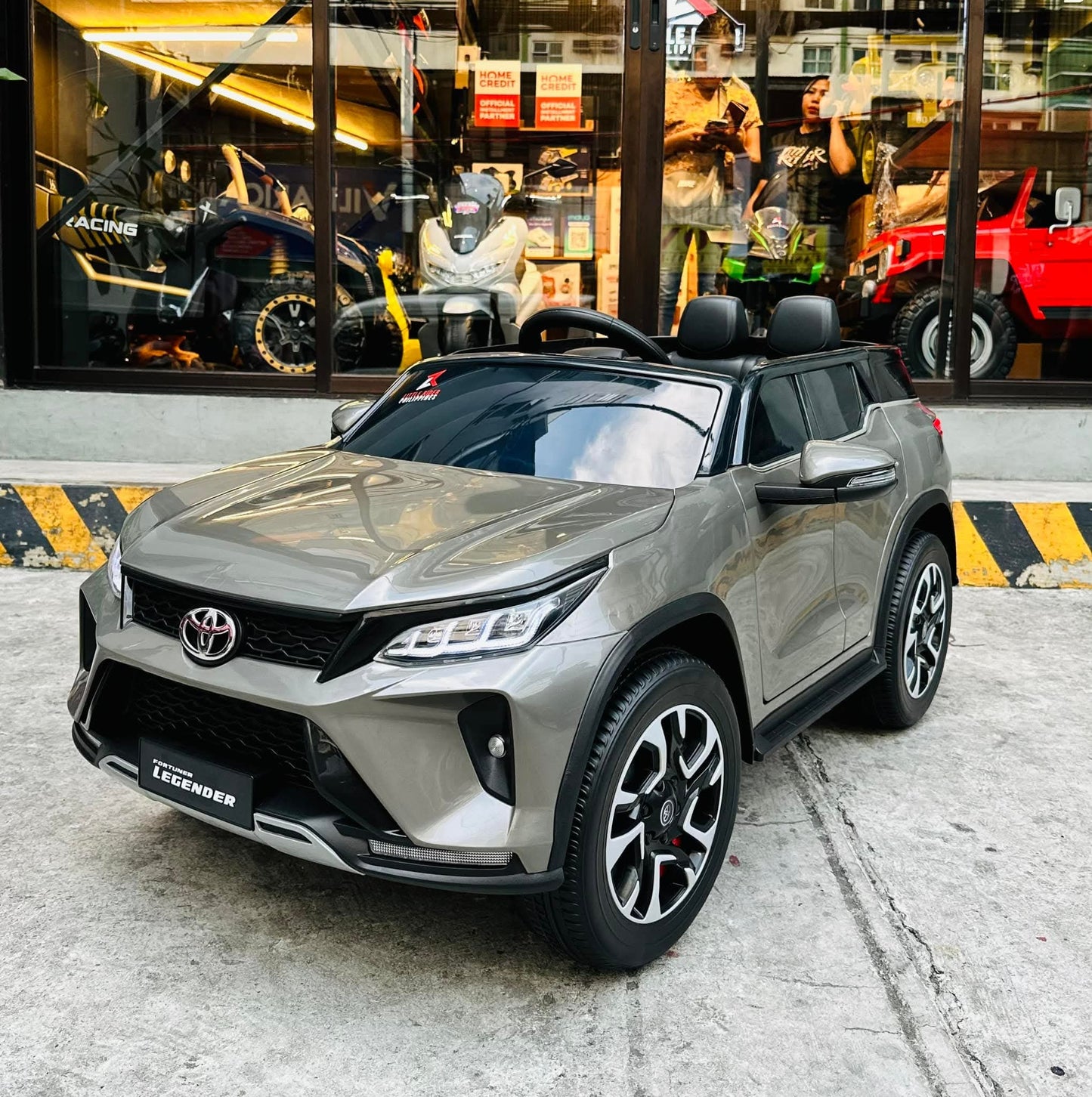 Gray Toyota Fortune licensed ride-on car for kids Ahmedabad, front view, perfect for outdoor play
