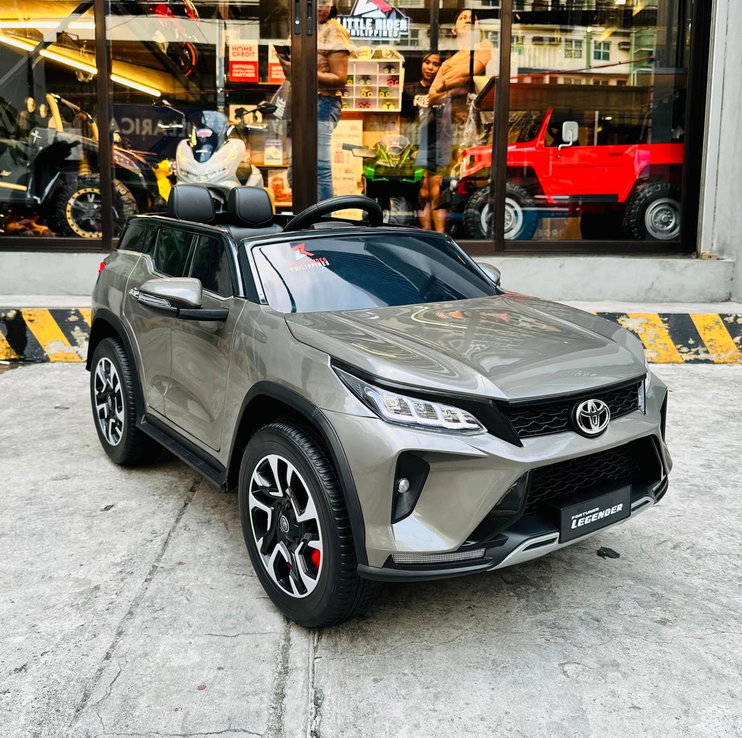 Silver Toyota Fortune licensed ride-on car for kids Ahmedabad, front view, perfect for outdoor fun