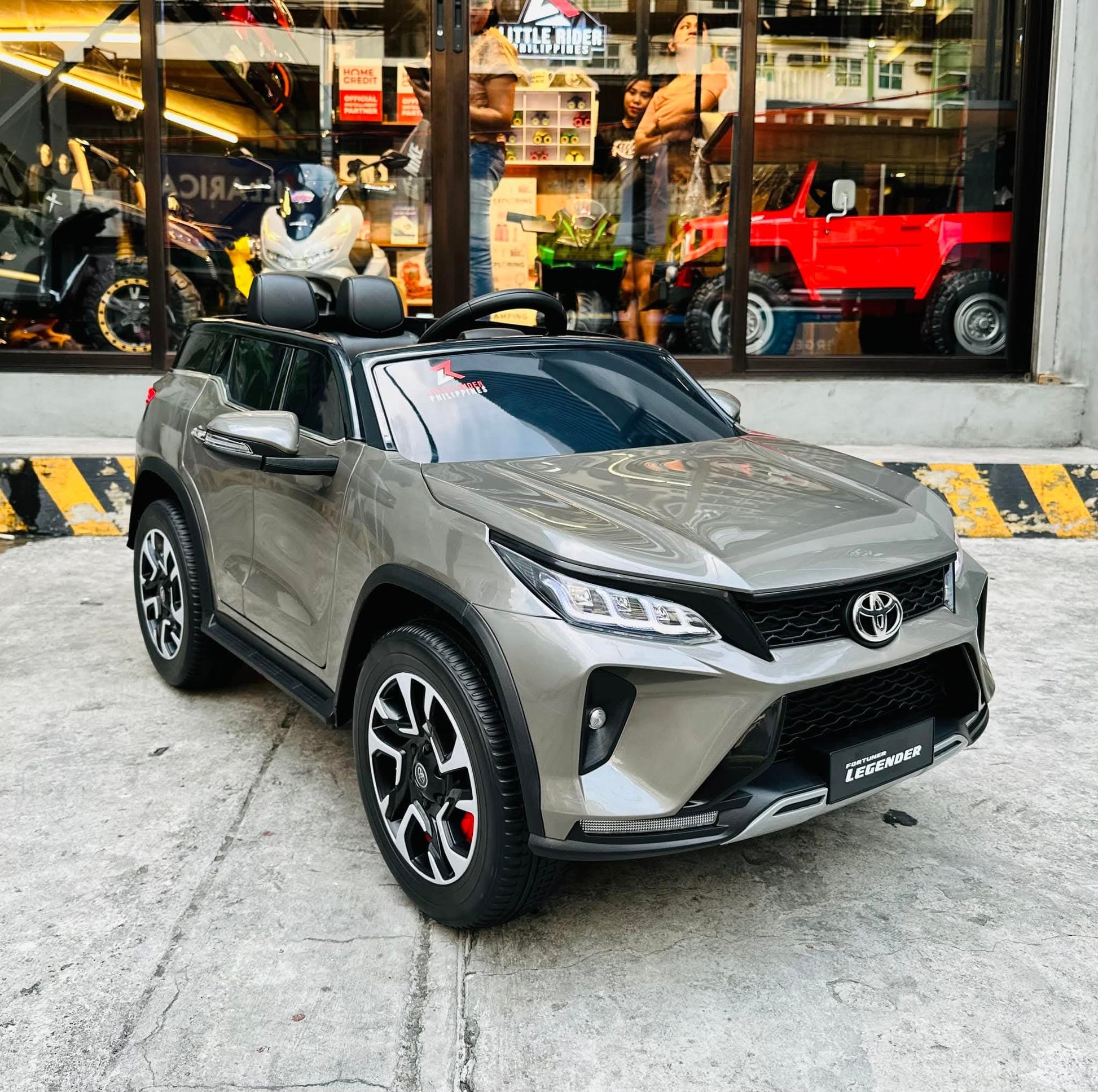 Silver Toyota Fortune licensed ride-on car for kids Ahmedabad, front view, perfect for outdoor fun