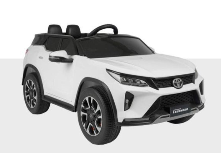 White Toyota Fortune licensed ride-on car for kids, front view, perfect for fun in Ahmedabad