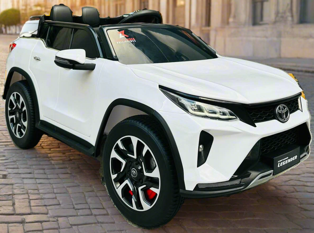 White Toyota Fortune licensed ride-on car for kids Ahmedabad, side view, perfect for outdoor adventures