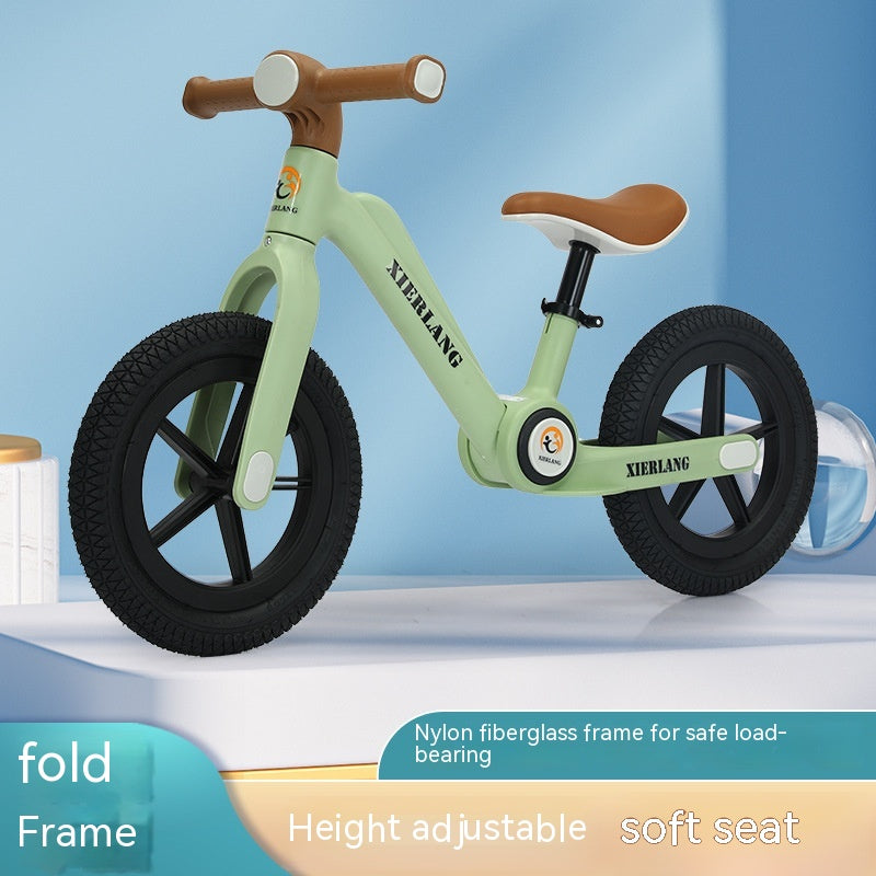 Green bike balance kids bike Sam's World Ahmedabad for ages 2-5 with a soft seat and adjustable height