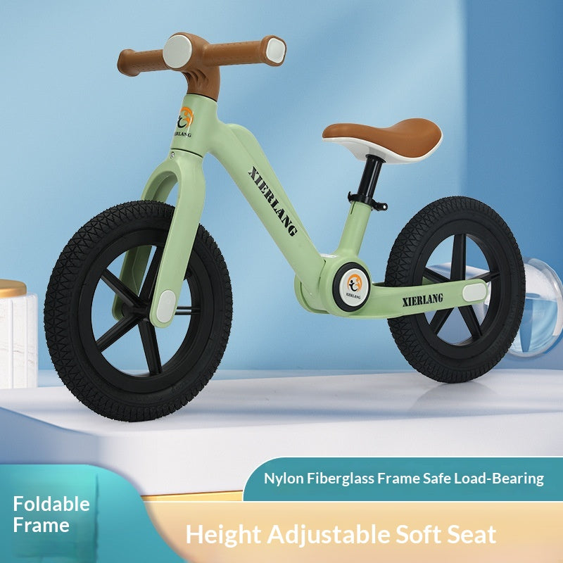 Kids balance bike in green with soft seat, suitable for toddlers, available at Sam's Toy World, Ahmedabad
