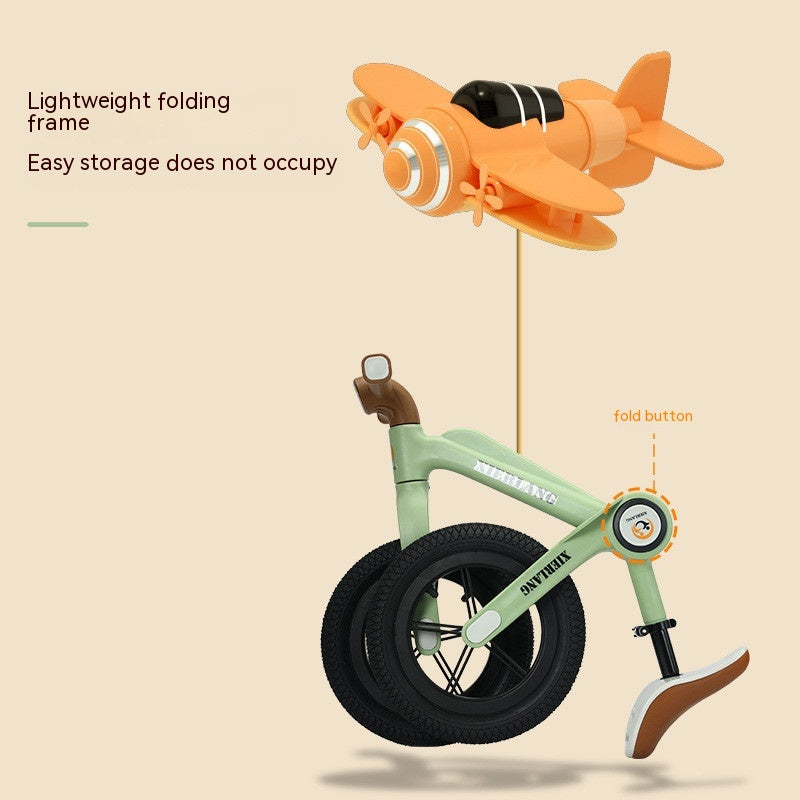Kids balance bike in green with orange airplane design for ages 2-5 at Sam's Toy World, Ahmedabad